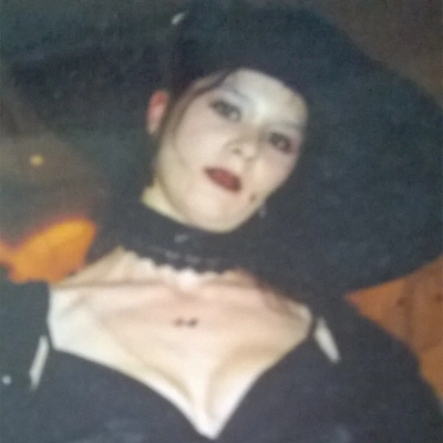 Anna Smith Spark, British fantasy author, dressed as a witch for Halloween.