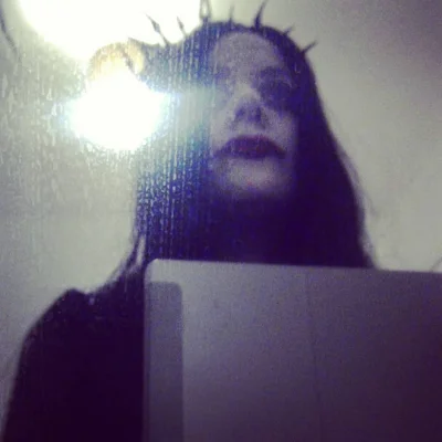 E.M. Faulds, British science fiction and fantasy author, dressed as a dark queen for Halloween.