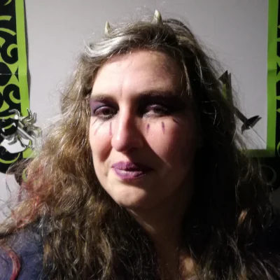 Karen Fishwich, Chair of World Fantasy Convention 2025, dressed as a demon for Halloween.