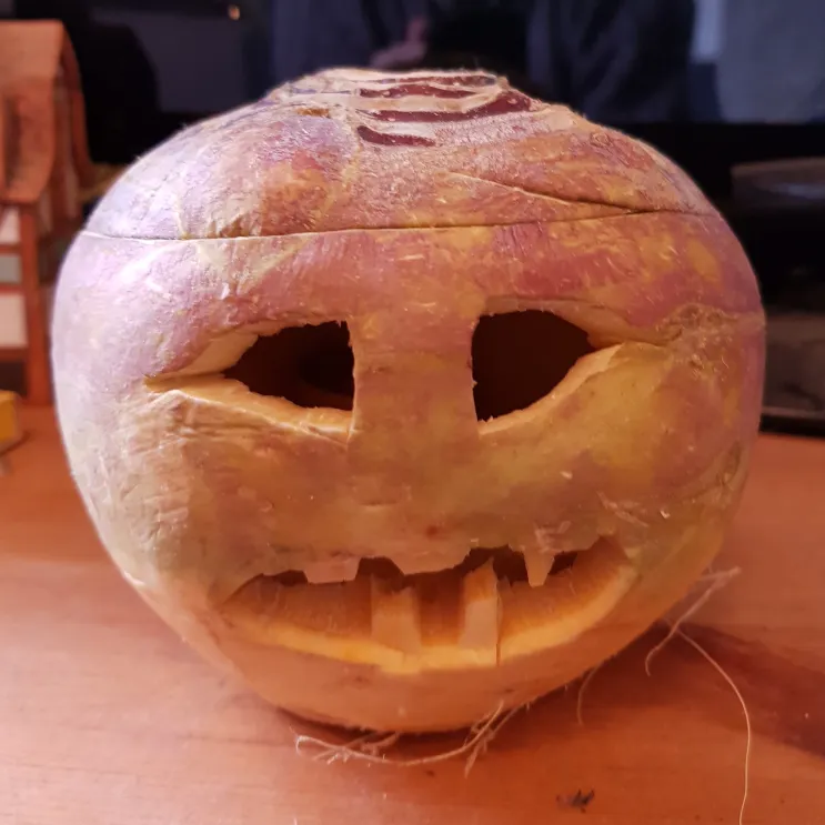 A scary face carved into a turnip. Unlit. Photo credit: Neil Williamson.